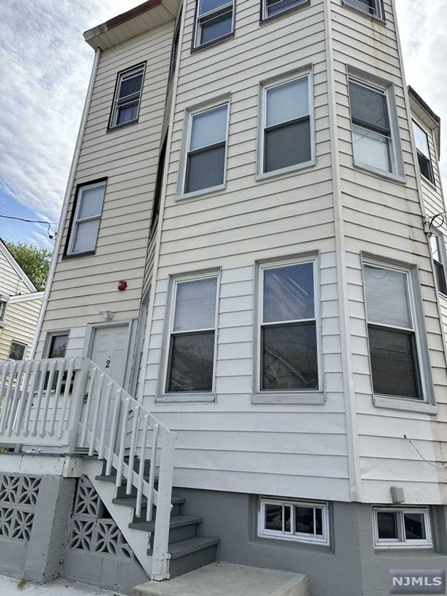 Freshly Painted 3 bedroom, 1 bath rental on the 3rd floor of a 3 family home. parking space for 2 cards included.