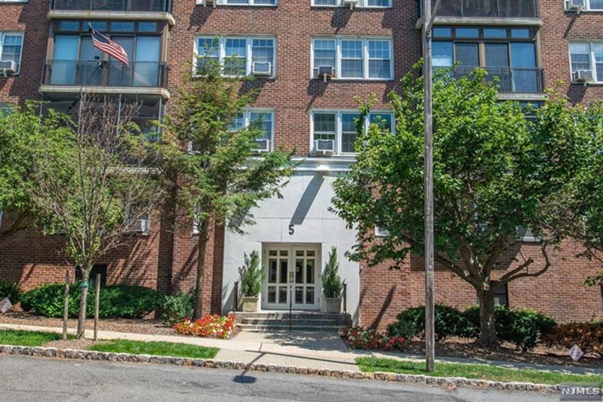 Bright and spacious condo in the heart of Montclair! Located minutes away from the Wellmont theater, restaurants, Whole Foods, Montclair Public Library, and NYC transportation. This 2 bedroom 1 bath condo features an open concept living/dining room, parquet floors, large walk-in closets, galley style kitchen, and an enclosed porch to enjoy outdoor evenings. The sun-filled large primary bedroom has a huge walk-in closet for ample storage. Overlook the NYC skyline when entertaining on the rooftop terrace! The unit also includes an assigned heated garage parking spot, and on-premise laundry facilities. Come and live the Montclair lifestyle!