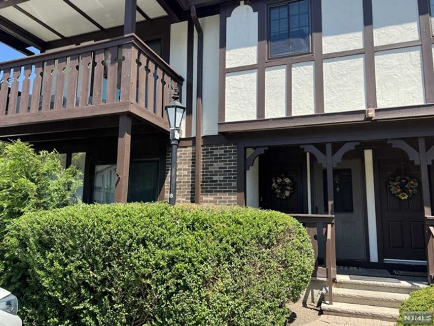 WELCOME TO THIS BRIGHT & SUNNY END UNIT IN DESIRABLE RIDGE GARDENS! MAKE YOURSELF AT HOME IN THIS 800+SF 1 BEDROOM, 1 BATH UNIT WITH NO STAIRS. UPON ENTRY,YOU ARE WELCOMED INTO THE SPACIOUS LIVING ROOM WITH WOOD BURNING FIREPLACE WITH SLIDING GLASS DOOR TO AN OVERSIZED BALCONY. THE KITCHEN HAS BEEN UPDATED WITH GRANITE COUNTERS, TILED BACKSPLASH & STAINLESS STEEL APPLIANCES. ALSO ENJOY A NEWLY RENOVATED BATHROOM WITH QUARTZ COUNTERTOP. THE BEDROOM IS A NICE SIZE & HAS AN ADJOINING WALK-IN CLOSET. THE LAUNDRY AREA IS LOCATED IN THE HALLWAY FOR CONVENIENCE. THIS UNIT ALSO INCLUDES A 6' X 8' CAGED STORAGE AREA LOCATED IN BUILDING 19. GET IN JUST IN TIME TO TAKE ADVANTAGE OF THE POOL & TENNIS COURTS!