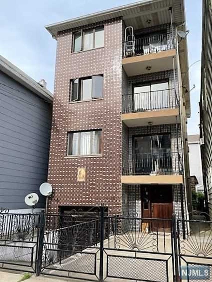 This large unit located in 2nd floor offers 2 bedrooms, large living room and eat in kitchen and a large full ceramic tiled bath with lots of natural light through all sides of this house is offered to be rented and available now. New SS refrigerator and shared laundry facility on site are offered. Unit freshly painted. A very desirable location near Public Transportation, main Street and walking distance to Path Train Station...A must see to appreciate. With one parking space included, the rental amount is $2,150. Tenant responsible for the realtor's rental fee of $1,850