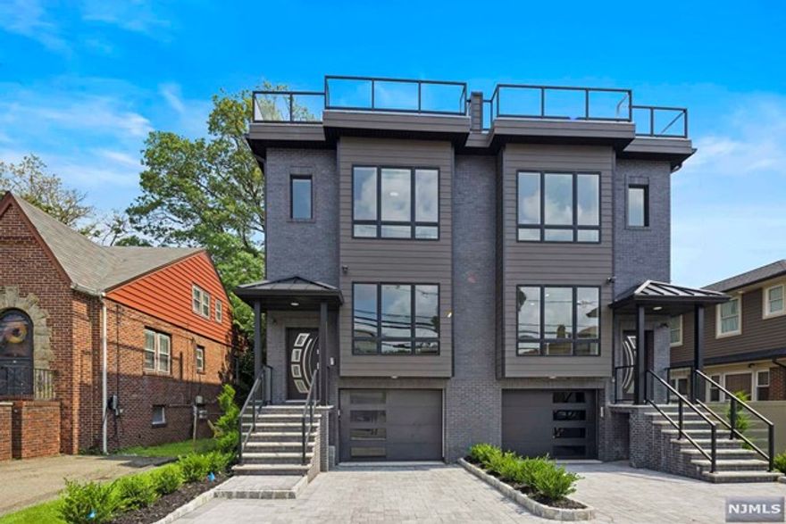 Construction Completed! Live atop the Palisades in Cliffside Park! - Both Sides Available ! A New Construction townhouse built for the most discerning buyer - 4 levels spanning over 3000SF - A home like no other on the cliffs. Exquisite finishes - solid oak floors - oversized Anderson windows - Modern Chef's Kitchen complete with custom cabinetry, double quartz countertop, Island with waterfall edge - high end appliances - gas fireplace - Equally impressive Master Bedroom is bright and spacious. Master Bathroom features a double sink, porcelain tile, skylight - Rooftop level offers a wet bar with wine fridge and half bath. Private rooftop terrace overlooking the Hudson River with views spanning across Manhattan - Ground floor features additional bonus room with full bathroom - ideal for home office, gym, movie, or guest suite! Don't miss the opportunity to own a brand new home above it all in Cliffside Park's most desirable neighborhood!