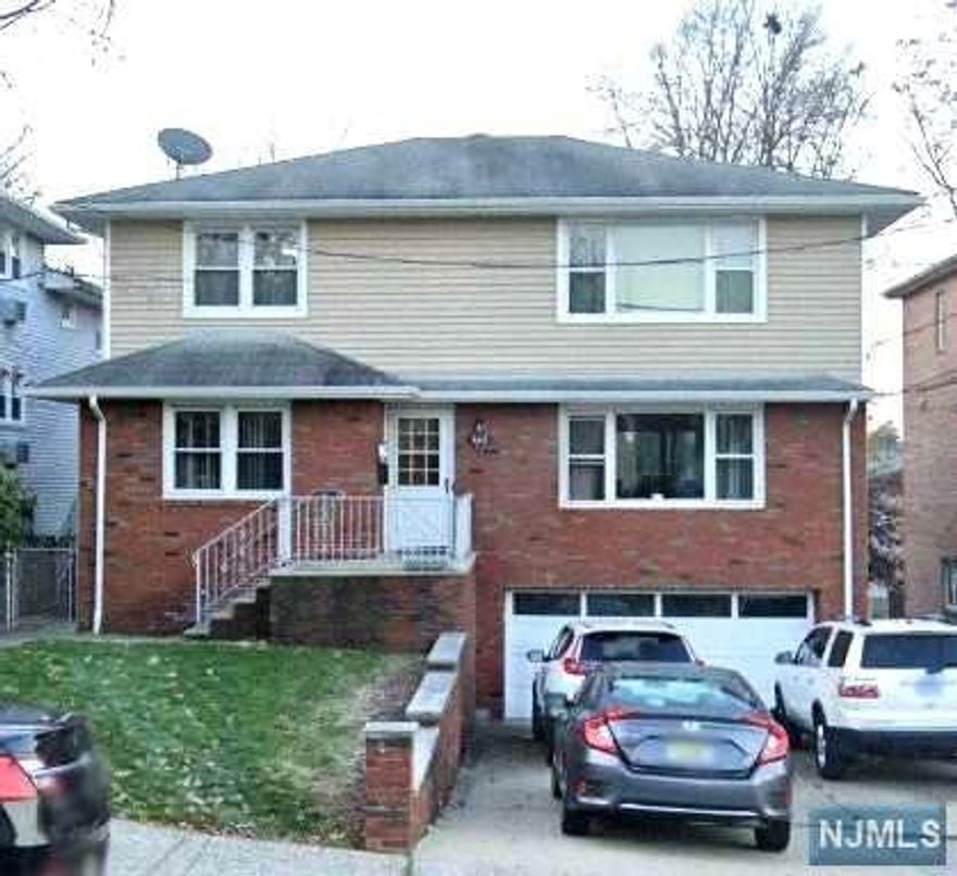 Newly renovated 2family house 1st floor. New kitchen, new bathrooms. new floor, newly painted. 1 garage attached . 2 car tendum parking spaces. close to NYC transit, Broad ave, restaurants, school, shopping......