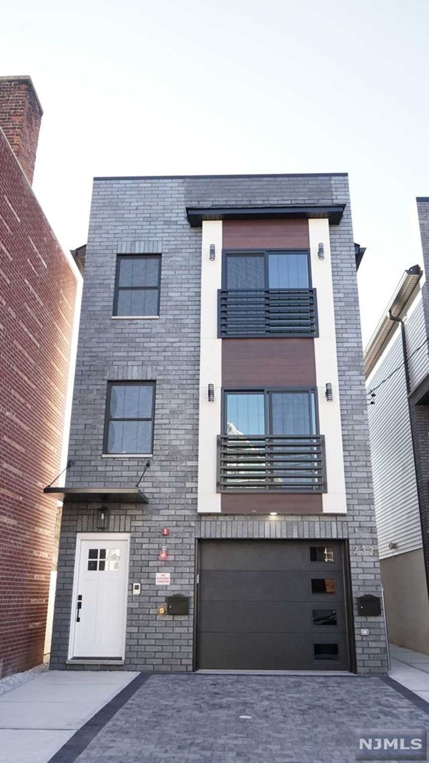 New construction 3 bedroom apartment with a modern interior design! Apartment has 2 floors: ground floor with 1 bedroom/1 full bathroom/recreation/garage/backyard/closet spaces, and the first floor consists of 2 bedrooms/2 bathrooms/living room and kitchen space/ stainless steel appliances/hardwood floors. Near central shopping areas and is within minutes of path train to New York, schools/colleges, worships, and more! Tenant pays 1 month broker fee. A beautiful must see!