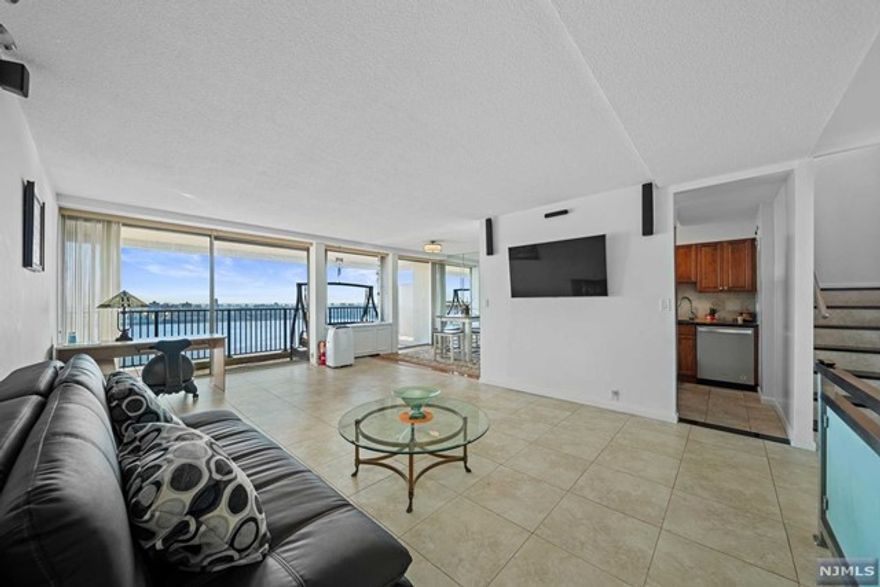 ***CALL/TEXT ERIC @ 201-421-5949 FOR SHOWINGS*** Discover luxury living at Horizon House with this exquisite 1-bedroom listing offering breathtaking views of the iconic NYC skyline. Indulge in relaxation with a jacuzzi tub in the stylish bathroom. Entertain effortlessly in the living room equipped with a surround sound system, creating a perfect ambiance against the backdrop of the mesmerizing cityscape. Full service luxury amenities include a 24-hr doorman, community room, gym, laundry, 2 outdoor swimming pools, tennis courts, and public transportation just steps from the complex. TOTAL MONTHLY CARRYING COST of $1,842.07 includes Maintenance ($1,584.54), Garage Parking ($108), Cable ($48.90), and Assessment ($100.63). Maintenance includes property taxes, ALL utilities, and as of 2024 ALL AMENITIES (Pool/Gym/Tennis) are also included! All cash purchase requires a minimum income of $88,419/year. Subject to board approval: Min 25% down, 4-to-1 Income-to-Debt Ratio.