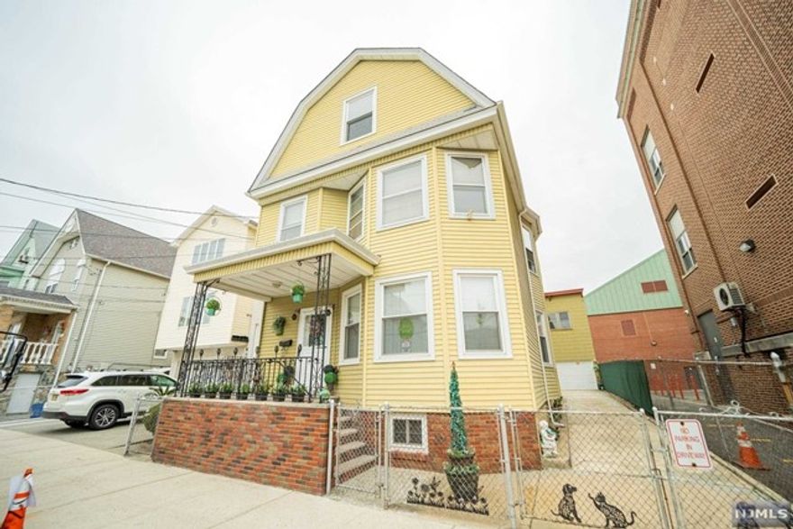 Landlord pays half broker's fee. Tenant only pays half broker fee. Large, spacious & bright 6 room, 2 bedrm, 2nd fl apartment, which includes heat, laundry hook ups and light storage in basement, den (perfect for home office), living rm, dining rm & pantry. Hardwood floors. New windows. Large eat in kitchen, walk in pantry, includes refrigerator (working but as is). Apartment has front and rear entrance. Center of town location near PATH train to NYC. No smoking of any kind on premises. Street parking only. No pets. Tenant supplies own cooking gas, hot water & electric. No use of yard. Landlord requires application, credit check, and proof of ability to pay rent.