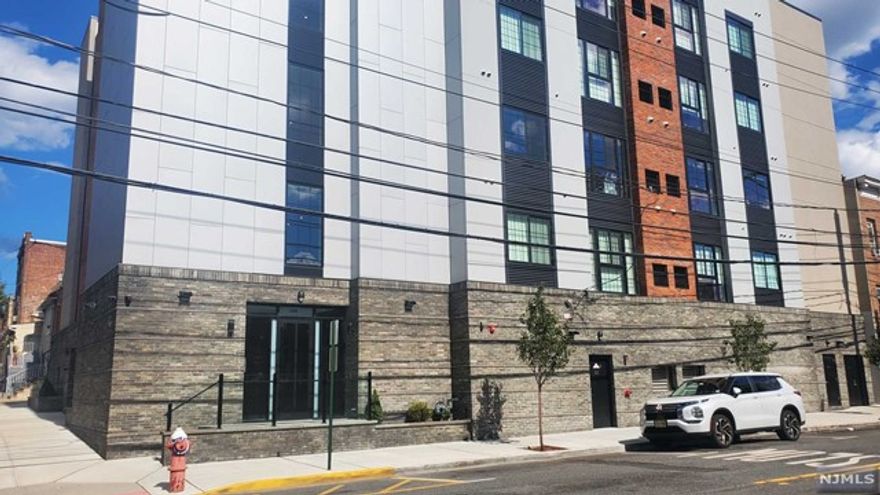 Modern design and amenities for todays lifestyle. This open layout and sunny unit is on the top floor. Open kitchen with modern appliances. One bedroom plus den for more living options. Washer and dryer in unit. Luxurious waterfall shower. Great views of Manhattan. Indoor parking Space. Workout room. Elevator. Easy public transportation within steps. Bus lines 22, 84, 156, 159, and 181.