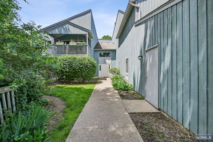 This stunning 2 Bedroom, 2 Bathroom unit offers the perfect blend of style and comfort. Unwind in the open Living Room and Dining Room, ideal for entertaining. Wonderful kitchen featuring quartz countertops, stainless steel appliances and a breakfast bar. The Primary Bedroom includes an ensuite bathroom and walk-in closet. Relax and take in the lush surroundings on the private patio. The ultimate convenience: in-unit laundry completes this space. Drakesville Complex has a community Pool and Tennis Courts. Unit also includes one private garage for parking and additional storage, also 1 driveway parking space outside the garage. Easy access to Routes 80, 10 and 46 and the Mt. Arlington Train Station.