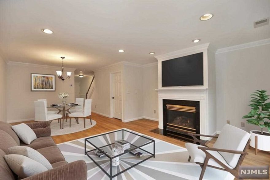 Welcome to Franklin Heights! Easy living and conveniently located near shopping and major highways. The property offers entry foyer, living room with fireplace and balcony, dining area, and updated kitchen.2nd floor features master bedroom w/ master bath, large second bedroom, hall bath and laundry. All wood floors. Lower level is finished and can be used as office or playroom. Utilize the outdoor pool and tennis courts this summer! Simply unpack and enjoy!