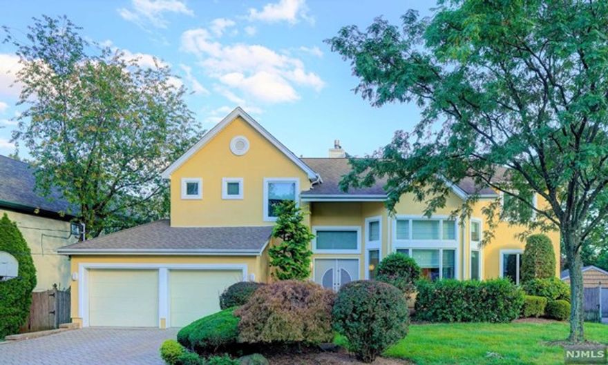 Beautiful Contemporary home with open space layout and in a great location for NYC commuters, very close to bus stop and GW Bridge. First floor has double story Great room, beautiful Kitchen with breakfast area, Family room with a fireplace, Dining room, separate Office/Den, Powder room, large deck and patio and two-car garage. Master suite, master bath, large WIC, three large bedrooms, and full bath are on the second floor. Fifth and Sixth Bedroom is in the recently renovated and finished basement with full bath, large playroom, laundry and plenty of storage. Beautifully landscaped grounds with fully fenced backyard and deck off the family room for entertainment. School bus at corner. Great opportunity! Low taxes!!! Call now.