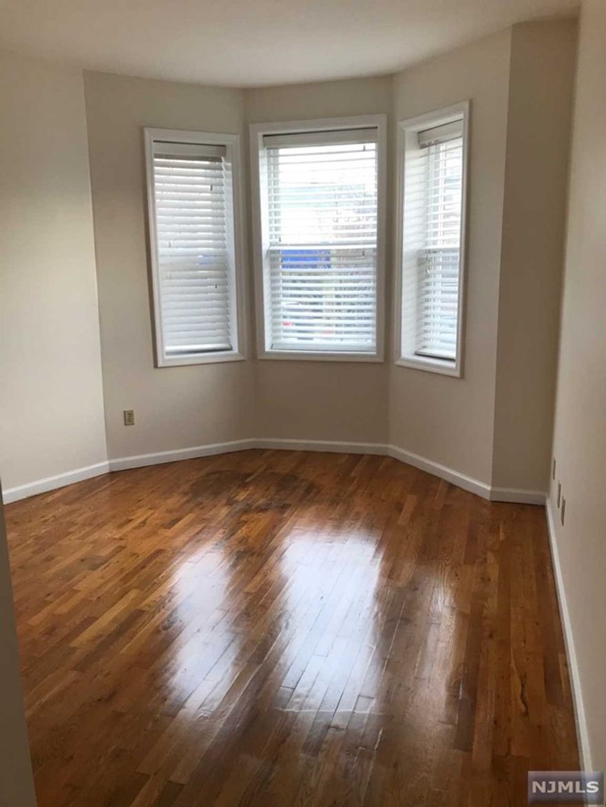 Renovated, modern, clean, updated one bedroom. Bright & sunny. Only short walk to Bay St train station to Manhattan. Close to all transportation, shopping & restaurants. Central A/C. Laundry (coin operated)in basement. Storage bin included. If available, one car outside parking optional. Pets considered.