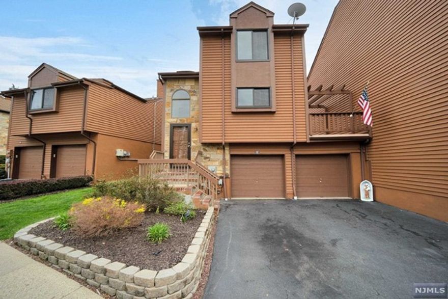 Beautiful well Maintained Move in ready 2 bdrms, 2.1 bths, 2 car garage, Canterbury ll model with HW floors, New windows, New Anderson sliding door , Newer roof, Updated baths, whole house complete with new neutral paint . Convenient to shopping mall, close to public transportation to NYC. First level entrance to Living room with gas fire place, to Dining room, half bath and Beautiful Kitchen with breakfast bar and access to a large deck. Second floor entering to Master bedroom with walk-in closets, and to second bedroom with en suite.