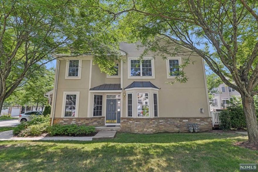 Welcome to Grandover Pointe! This bright and contemporary townhome is an ideal blend of expansive and adaptable spaces for work, leisure, and relaxation. The kitchen serves as the heart of the home, flowing into both the open dining and living areas on one side, to a patio with picturesque views on the other. Featuring granite countertops and a breakfast bar, the kitchen is elegantly appointed, while the family room boasts a warm and cozy feel with a striking fireplace, leading you to the private den and powder room. Upstairs, the primary suite features a full bathroom with a jetted tub, two walk-in closets, and an abundance of natural lighting. Completing the second floor are two spacious bedrooms, a hall bathroom and a large catwalk overlooking the foyer. Perfect for hosting guests, the fully finished basement offers a large recreation room with ample storage, as well as an additional lounging or office space. Conveniently located near shopping centers, schools, and more!!