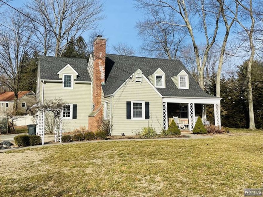 Prepare to be impressed w/ this charming center hall colonial located in the heart of Wyckoff! Steps away from NYC transportation & thoughtfully updated at every turn. Refinished hardwood floors, updated baths, RO filtration & custom closets to name a few. Step up to a welcoming lemonade porch to enjoy on pleasant days & walk into a sun drenched living room with custom built-ins & spacious dining room for entertaining. A clean white kitchen w/ subway tile backsplash & breakfast nook offers a great layout for every day enjoyment. A large family room w/ tray ceiling and perfect views of the beautifully landscaped yard & paver patio await you in the back of the home. A mudroom equipped w/ storage is conveniently located right off your 2-car heated garage. The second floor features 2 bedrooms, updated FB, & impressive primary suite w/ walk-in closet & stylish primary bath. Partially finished basement allows for additional storage & steam W/D laundry. Prepare to call this one home!