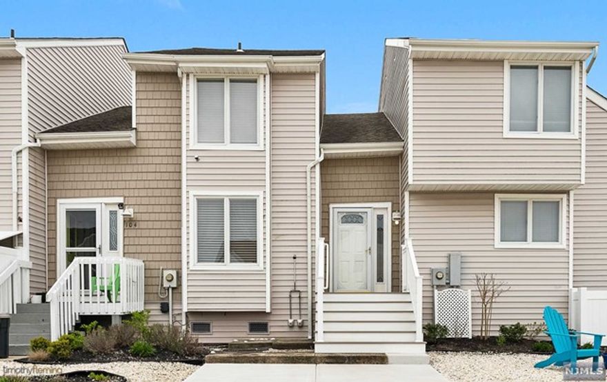 Enjoy spectacular and unobstructed Intracoastal water views, and those gorgeous pink/red/cantaloupe-colored sunsets from your private back deck or just about any room in the house, since the adjacent Green Acres land is protected. Located in very desirable DIAMOND BEACH, priced-to-sell 2 story townhome offers 3 nice sized bedrooms and 2 full baths. The main floor features a spacious bedroom which may be used as a master bedroom, a full bath, open concept 2 story cathedral ceiling living room with skylight, a wood-burning fireplace, kitchen, and the dining area with sliders to your relaxing rear deck. The upstairs features a large bedroom with plenty of closet space, another bedroom, and a full bath. This home is being sold fully furnished minus personal items. Recent upgrades include new planked vinyl floors, new Temper-Pedic mattresses throughout, and new solid custom made coastal-designed interior doors, For those chilly nights enjoy your fireplace, HOME WARRANTY INCLUDED