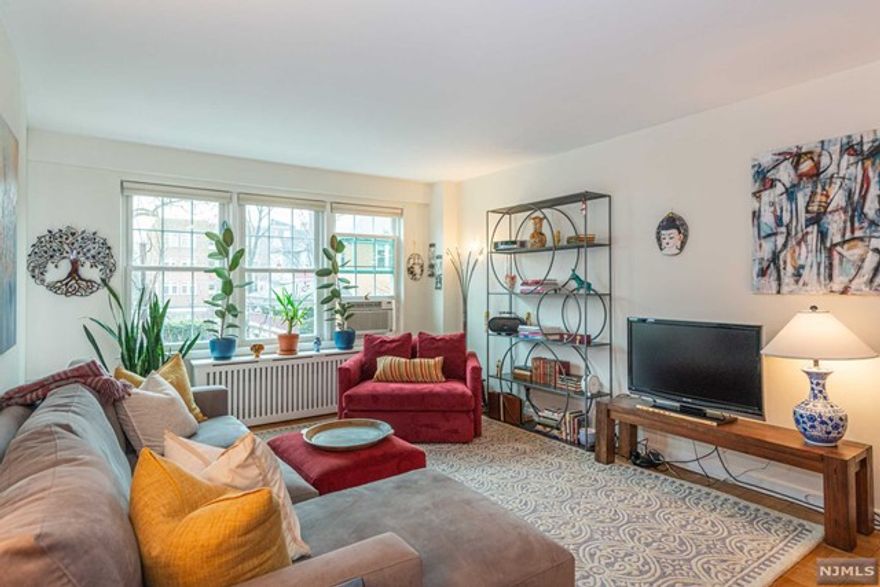 OFFERS DUE TUESDAY AT 3PM. Move right in to this sundrenched 2 bed/1 bath condo in Fullerton Condos. Enter the bright and airy living room/dining room combo featuring beautiful parquet floors. Loads of deep closets. Kitchen features newer appliances and granite countertops. Kitchen flows to the enclosed balcony with paver tiles, exposed brick and sliding glass doors. Spacious primary bedroom features custom closets with built-in shelves. Second bedroom currently used as a home office. Both bedrooms feature custom blackout shades. Bathroom was fully renovated in 2021 and features Italian marble, classic Kohler pedestal sink, Kohler toilet and soaking tub. Other features include: deeded upper-level assigned garage parking spot, unit freshly painted in 2021, laundry room on-site, 2 window AC units (2021), rooftop deck, secure storage unit, concierge and smart intercom video system. Cats OK (board approval reqd) NO DOGS.