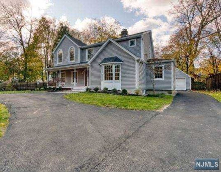 Totally remodeled Colonial with an inviting curb appeal. Walk into a spacious foyer that leads to large dining room joined by an exquisite gourmet kitchen with a huge island and top of the line appliances with beautiful countertops. Across from the dining area is a large living room with a wood burning fireplace; a great home for family gatherings or entertaining. Guest bedroom with a huge walk-in closet/bonus space and a full bath completes this floor. Upstairs features a master bedroom suite with cathedral ceiling, elegant master bath and a walk-in closet, two bedrooms, a full bath, second floor laundry room plus a full finished basement. Other features: gleaming new hardwood floors throughout, recessed lighting, new HVAC & water heater, new siding and roof, lawn sprinkler system, circular driveway, huge fenced in backyard, large front porch, and so much more. Close proximity to schools, shopping, entertainment, houses of worship, 9W and NYC bus.