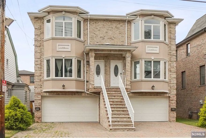 Beautiful Duplex located on a quiet street in Cliffside Park. Spacious townhome with open floor plan, hardwood floors and high ceilings. Features include a Fireplace in the Living Room and walk out patio. Large open Eat-in kitchen with granite counter top, maple wood cabinets, and tiles. Primary suite with full bath and double sinks. In unit laundry on the second floor for your convenience, washer and dryer included. Lower level Family room with half bath, attached 1 car garage with additional parking space on property. Close to transportation to NYC