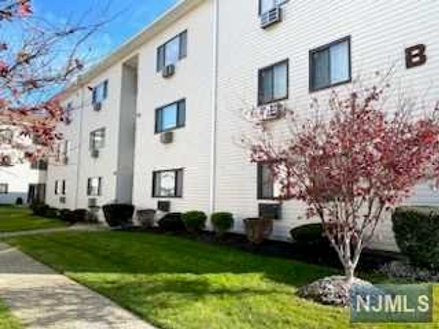 Welcome to Valley Manor, a cozy condo community nestled in the center of town, directly across from a bustling shopping center and steps away from NY train and bus lines. A commuter's delight! This bright and spacious unit boasts all new flooring throughout, has been freshly painted and is squeaky clean. Excellent closet space (primary bedroom has large walk in closet) and there is additional locked storage available in the basement. There is a laundry/utility room in the unit with full size washer and dryer and all appliances are included. One parking space is designated to the condo. There is plenty of visitor parking available. Low HOA fees and is pet friendly (under 50lbs)! Great condo to call home!