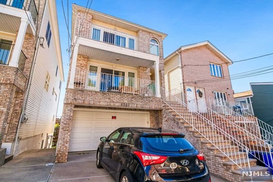 1 Month BROKER FEE! Come tour this oversized 3BR/3BA duplex unit with amazing location with NYC views at all levels! Recently updated with hardwood floors, granite counter tops, master bath and closet with jacuzzi, two car parking on site, and abundance of living space. House amenities include central A/C, gas heat, gas stoves, washer/dryer in each unit, and four balcony with amazing views. House is conveniently located few minutes north of the Bergenline Avenue Light Rail Station, which brings commuters to Hoboken (14 minutes)and/or to Jersey City (24 minutes). Alternatively, you can enjoy an easy 25-minute commute to Port Authority in Manhattan via the bus line located minutes walking on Bergenline Ave. No Smoke. Only Pet only under 20lbs with $300 non-refundable pet fee.