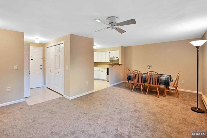 Great condo in excellent location right in the heart of desirable Pompton Plains! Brand new carpeting and freshly painted throughout. The kitchen boasts a brand new stove and range. Washer and dryer in unit, plus updated full bath. Generous sized bedroom has walk in closet. Abundance of storage throughout. Condo is clean and welcoming, nothing to do but unpack your bags! Low taxes and monthly fee, with beautiful outdoor pool, bbq area, tennis court, and plenty of parking! Excellent location includes access to nearby bus, shopping, convenience store, library, major highways, and more! Don't miss this one!