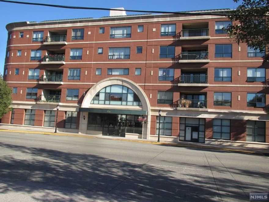 Come view this recently renovated one bedroom condo in the much desired Station Square Building. This unit is bright with plenty of natural sunlight. Features good sized entry foyer with plenty of closet space, upgraded kitchen, dining area, living room with sliders to balcony (very private view), bedroom with large closet, and full bathroom. Other features include engineered hardwood floors throughout, new LED lighting with dimmer switches, and new window shades. Laundry is directly inside unit (seller will provide brand new washer/dryer prior to closing). One indoor parking space (#66) included as well as storage area on the ground floor. This elevator building is a commuter's dream situated across the street from the train station and NYC bus. Also only a block away from stores and top rated restaurants. Don't miss out on this wonderful opportunity to be in a great community!