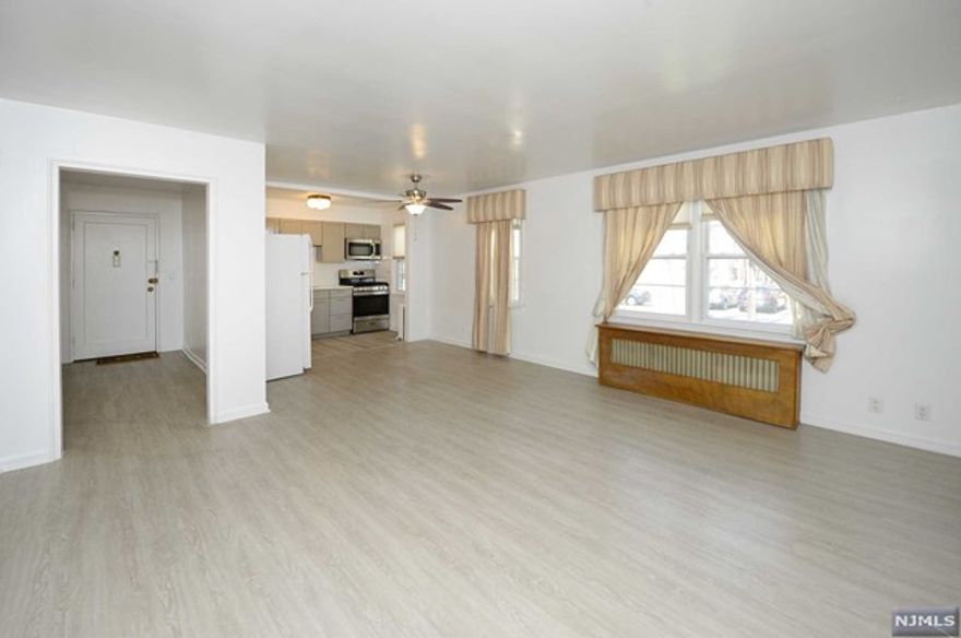 Welcome to your perfectly situated abode in the heart of Fair Lawn! This charming first-floor apartment offers the ideal blend of comfort and convenience for modern living. As you step inside, you'll be greeted by the warm embrace of hardwood flooring. The spacious living room provides ample space for relaxation and entertainment, perfect for unwinding. Two generously sized bedrooms offer plenty of room, complete with ample closet space. But the true highlight of this apartment is its unbeatable location. Situated just moments away from both train and bus stops providing easy access to NYC, commuting has never been more convenient. Also perfectly located near restaurants and shopping! Welcome home to your urban oasis!