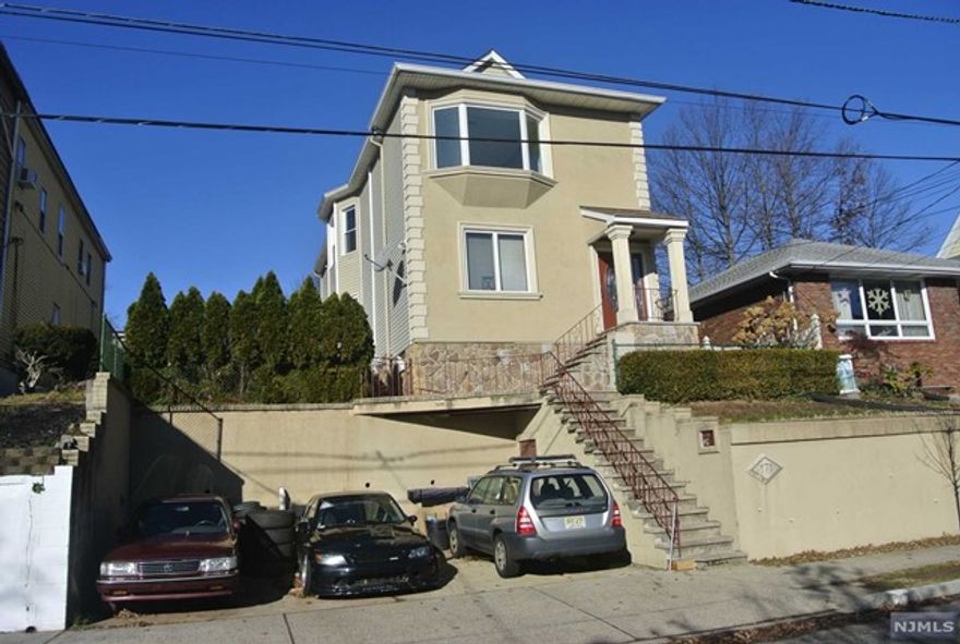 Newly renovated 2nd floor rental unit with a spectacular NYC view. Modern, freshly painted with new floor, new eat-in kitchen with SS appliances and island, pantry, open floor plan living/dining, 3 bedrooms, brand new full bathroom. Central air, 9ft high ceiling, washer/dryer in the kitchen, walk-in closet, parking space on promises. Great location, walking distance to NYC transportation. Ready to move in immediately.