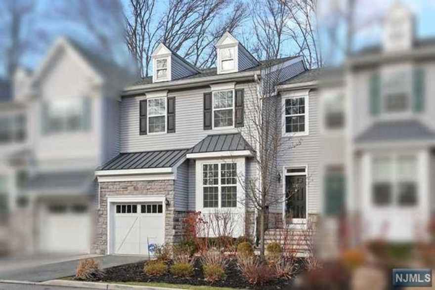 Gorgeous 4 yr. old "Bryn Mawr Model" townhouse on serene Cul de sac. 2,053 sf of living space and an additional 490 sf (approx) in basement.No expense has been spared in this 3br/3-1/2 bath home. Has all top of the line upgrades that builder offered. Open floor plan, featuring gourmet EIK, center island, granite counters, and GE Monogram appliances. Crown molding and hardwood floors.Master Bedroom features a spectacular granite bath, with huge soaking tub, seamless glass shower, and large custom WIC. Wonderful loft, compliments the two additional bedrooms and second full bath.The topping on the cake is the sensational finished basement. It is the ultimate TV room, game room, or party room. It features a full bath, wine bar, and surround sound. In addition, there is large storage room. New Furnace with 10 year parts/service warranty. (photos from prior listing)
