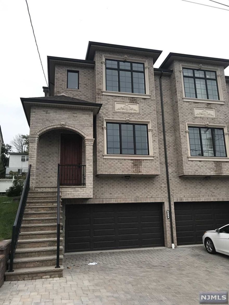 4 YEARS OLD LIKE NEW DUPLEX ON PRIVATE DEAD END STREET. OPEN LAYOUT WITH FINEST MATERIALS AND APPLIANCES. HARDWOOD FLOORS THROUGHOUT, SPACIOUS KITCHEN, HIGH CEILING, SKYLIGHT, 2 CAR GARAGE WITH 2 OUTSIDE PARKING SPACES. CONVENIENT LOCATION TO NY EXPRESS BUS, SHOPS, PARK, MAJOR HIGHWAYS. LANDLORD MAY CONSIDER A SMALL DOG.