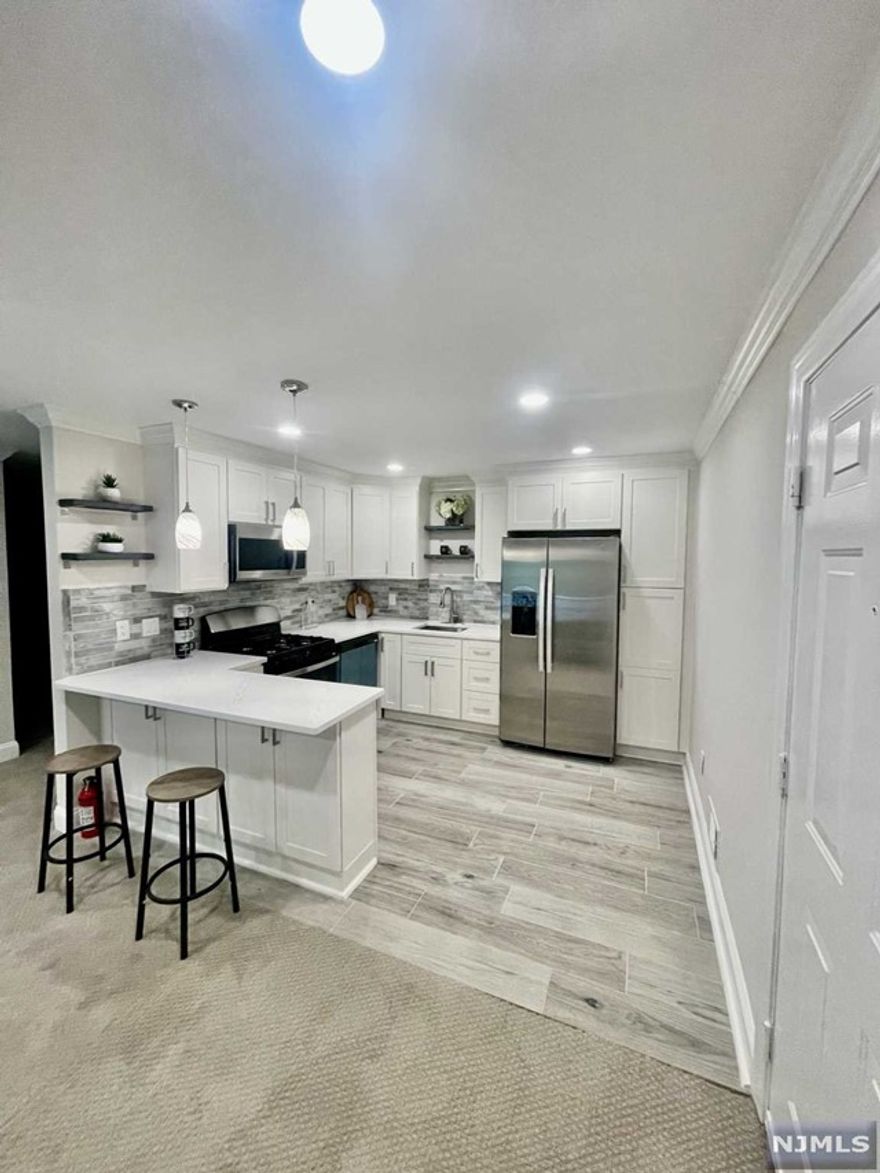 So much to offer here! Truly move in condition with a full renovation! This penthouse corner unit is quite and offers a tree line covered balcony. Come experience all that the highly sought after Society Hill community has to offer! Equipped with tennis courts, bike and walking trails and just a few steps away from the gorgeous pool. Parking spot is 2C3. Mailbox is #12.