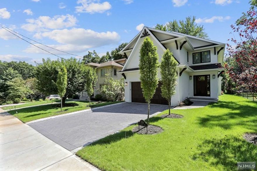 BEAUTIFUL NEWER CONSTRUCTION - Center Hall Colonial in close proximity to park, school and house of worship. Superior quality and finishes throughout. 4 Bedrooms on second floor (including primary suite, en-suite, and 2 additional bedrooms sharing one bath). 1 Bedroom in basement connected to a full bath. Large kitchen with over-sized island and top of the line appliances. Family room open to kitchen and to back yard. Basement is fully finished.