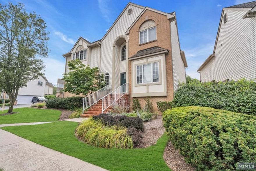 Spacious detached townhome with 3 floors of living space located in the gated community of The Crown Villas nested across the street from Eagle Rock reservation . Hardwood floors are through out this open floor plan living and dining room, cathedral ceilings with immaculate attention to details. Quartz countertop complement the eat in kitchen and family room with a gas fireplace adding to the warm decor. Private deck and an attached oversized 2 car garage. Custom blinds, light and bright second floor with 3 bedrooms, main bathroom and master en-suite accompanied with 2 walk in closets, vaulted ceiling, dual vanities with marble countertops, stall shower and soaker jacuzzi tub. Laundry room conveniently located on the 2nd floor. Full finished basement offers additional living and entertainment space. Plumbing work completed to add an additional half bathroom. Plenty of storage space. New furnace and smart thermostat installed in 2019. Community living amenities