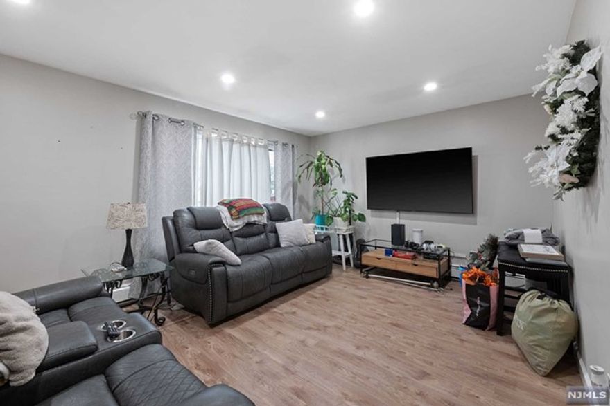 Great location, and low price for this rare desirable 2 bed/1 bath in Wood Ridge. Newly and beautifully renovated apartment on the 2nd floor of a well maintained 2 family home. Excellent location just a block away from the train station! Minutes away from commuting right into New York. New floors throughout, brand new bathroom, new kitchen with all new appliances (including dishwasher) and lovely stone countertops. Spacious layout, central AC. The Unit is also close to shops, schools and restaurants. This won't last long, book your showing today!