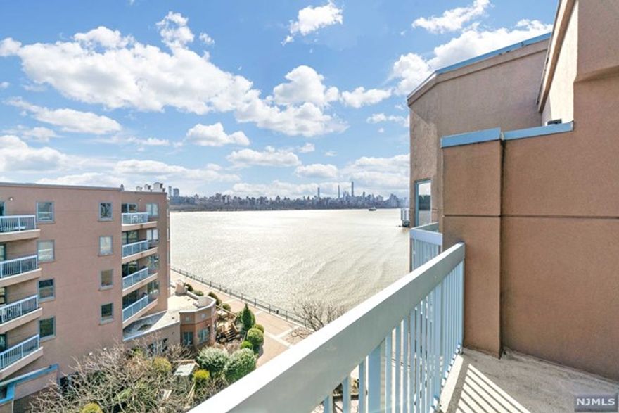 Recently renovated 2 BR, 2 BA Penthouse with NYC skyline views! Ideally situated in Independence Harbor, one of Edgewater's most premier waterfront, gated communities. Oak hardwood floors throughout, updated modern Kitchen with top of the line Kitchen Aid appliances. Spacious living room with access to private terrace offering views of Midtown Manhattan. Washer and dryer in unit. Two deeded covered garage parking spaces. Commuter's dream, steps away from Bus Stop to NYC. Within walking distance to shops, restaurants, and two shopping centers. Come check it out!