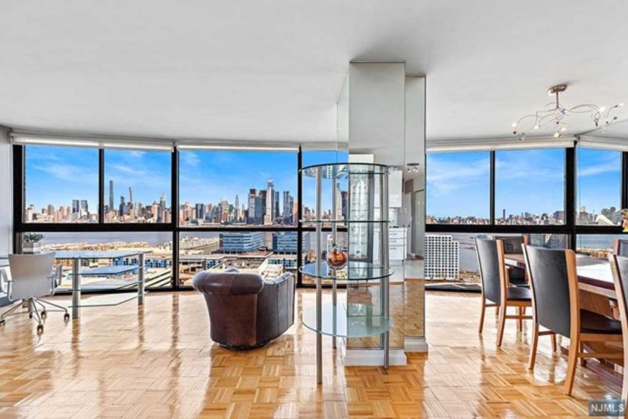 AHHH...that's the view I'm looking for! Troy Towers' most desirable north tower offers totally unobstructed views of the entire NYC skyline from the GW Bridge to Staten Island, enjoyed from glorious sunrise to glistening sunset from a 28 ft. expanse of floor to ceiling windows and strategically placed mirrored wall. Entertaining is easy with efficient white kitchen opening onto an extra large dining area and huge living room, with classic wood parquet tile flooring throughout. Guest bath features glass steam shower; en suite master bath has an extra long 6-ft. jet tub. Maintenance includes all utilities, Internet, premium TV and RE taxes. Garage parking is $150/mo. Free outdoor pool, 24-hr security & concierge, gym, Amazon Hub, bike storage, valet service & on-site laundry. Five minutes to the Lincoln Tunnel, Hoboken, waterfront restaurants, Whole Foods, Trader Joe's, parks and more. NYC buses and free PATH shuttles leave from front door during rush hour. 1 dog allowed per unit.