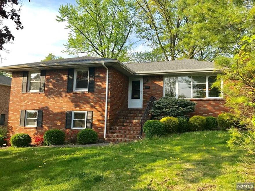All brick bright 3 bedroom ranch house on a quiet street yet close to everything! Primary bedroom withfull bath, fully finished walkout basement with full bathroom, renovated modern eat in kitchen lead to sunroom. Hardwood floor! The owner will take care of lawn and 2 car attached garages with 50 AMP fast charging plug outlet for electrical cars. 2 blocks from NJ Transit bus, near shopping, restuarants, park, 5 min to GW Bridge.