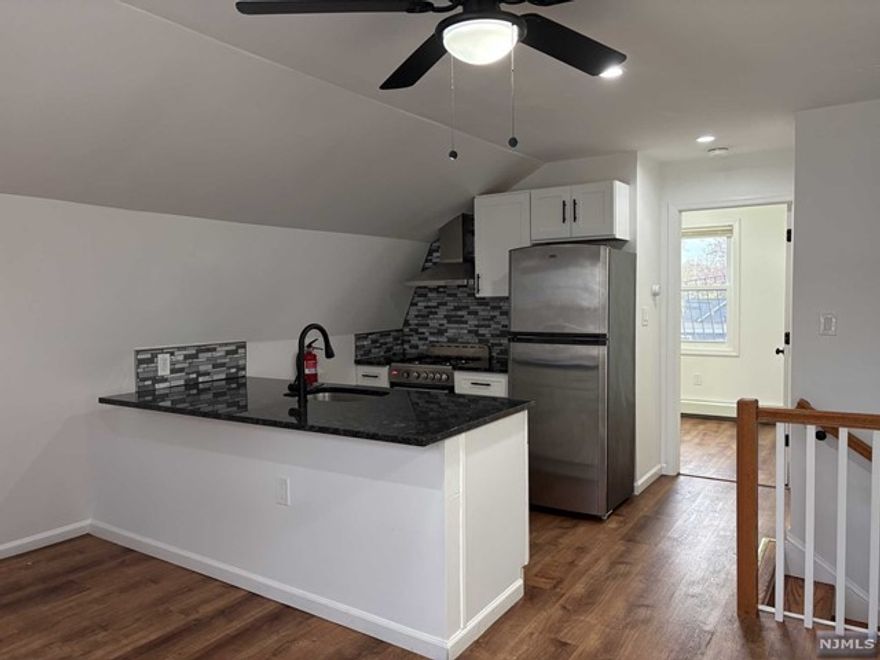 This beautiful, newly renovated 3rd floor unit sits on a quiet block, close to the Maplewood border. New everything--flooring, SS appliances, granite countertops, windows, and high-end black finishes. Property is equipped with security cameras outside. On-street parking. Looking for clean, quiet tenants. Easy access to GSP, schools, and shopping. 1.5 mo security deposit. No pets. NTN/Zillow report + income verification required.