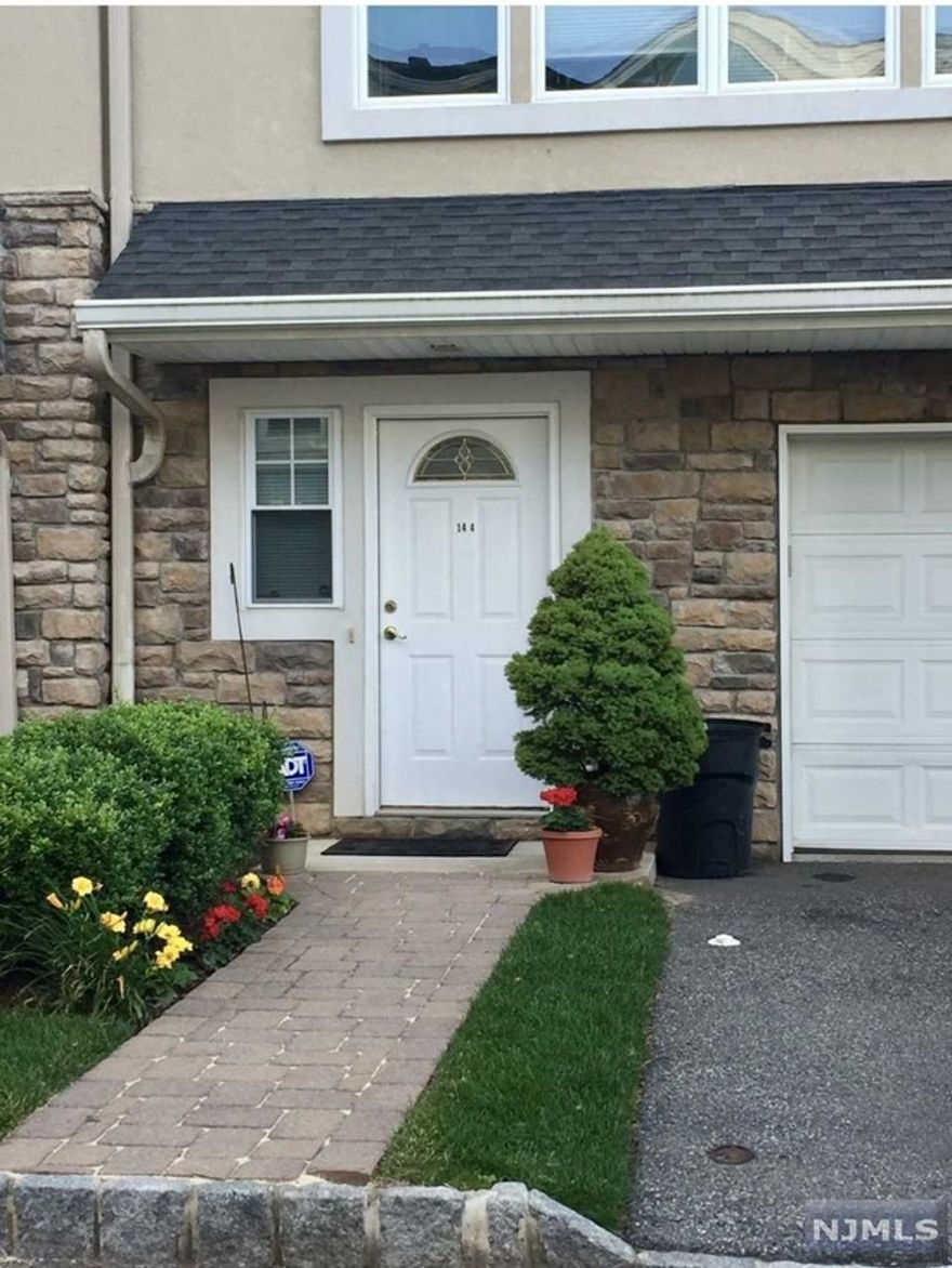 WELCOME to this amazing 4 story townhome in Rochelle Park! Just move right into this luxury Townhouse built in 2007. This unit offers Entrance Foyer with Ceramic Tiles, Family Room/Office/Den, or a 3rd Br w/walk in closet & 1/2 Bath on the Ground/1st level. 2nd Level has a Spacious LR with a lot of windows for natural light, Formal DR, Modern Kit w/Island, Granite Countertops, S/S Appliances, and Hardwood floors throughout. The 3rd level offers a primary suite with high vaulted ceilings, a 2nd bedroom, a full bath, and a laundry room. The full unfinished basement provides excellent storage space and room for recreation or a home gym. Conveniently located near Rt 80,17, 4 & GSP. Close to public trans & shopping malls.