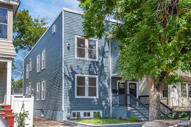 Step right into this exquisite 4-bedroom / 2-bath apartment in Irvington, New Jersey. The unit boasts a luxurious primary bedroom with en suite bath, high-end vinyl flooring, a kitchen equipped with quartz countertops, shaker cabinetry, and top-of-the-line stainless-steel appliances. Keep comfortable year-round with the central air cooling / forced hot air heating system. This residence underwent a full renovation in 2024. Need parking? You'll appreciate the extended driveway and additional off-street parking. Irvington is conveniently located just 9 miles west of New York City, making it a prime choice for commuters. Easy access to major highways such as the Garden State Parkway, New Jersey Turnpike, and Route 78. Enjoy outdoor activities at nearby Irvington Park with its tennis courts, baseball field, and playground. Indulge in dining, shopping, and entertainment in town or in the neighboring areas of Newark and Maplewood.