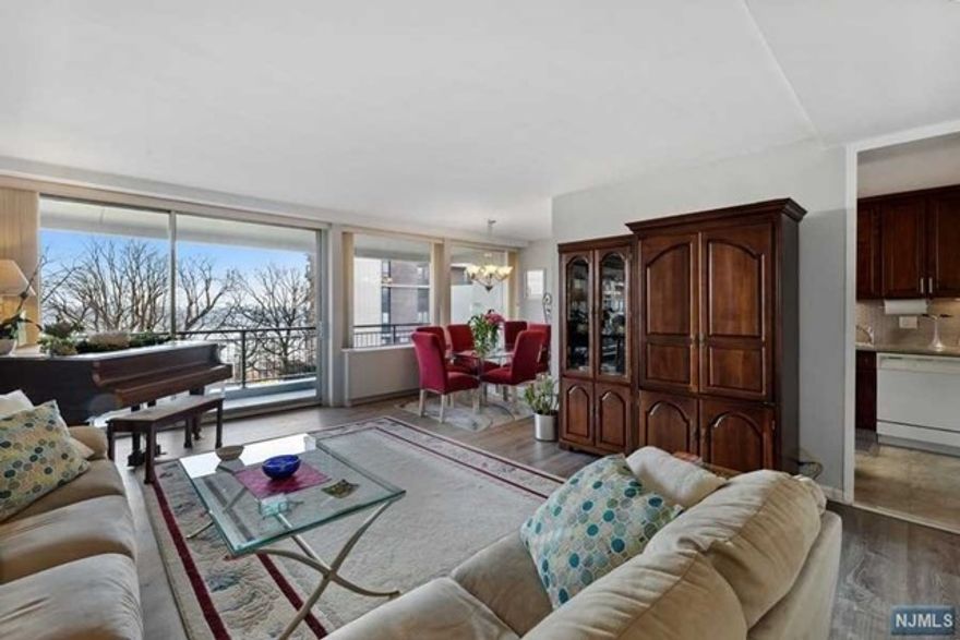 *HALLEY NATKIN (917) 626-8240 & COLDWELL BANKER REALTY* PRESENT 2 HORIZON ROAD #404. BEAUTIFUL! 2 Bedroom/1 Bath Bi-level Co-op at Fort Lee's Horizon House. **All living spaces and bedrooms on 1 level with Eastern Exposures from every room. GARDEN and HUDSON RIVER VIEWS. Updated & Move-in Ready -Galley style kitchen, Plank flooring Throughout, Primary Bedroom w/Huge walk-in closet, 24ft terrace, Great STORAGE space (2 walk-in closets!), and coveted INDOOR PARKING SPOT TRANSFERS with unit. Total Fees $1982.44 (Maint $1630.46, Cap Ass $207.08, Cbl $48.90, Indoor Park $96) INCLUDES ALL UTILITIES, TAXES, U/L mortgage, and Parking! *Maint. Fees are partially TAX DEDUCTIBLE!* Pool/Tennis/Gym memberships are optional and nominal addl. Fee. A wonderful community on 32 acres with 24 hr. Doorman, security, community room, gym, 2 pools, 2 tennis Courts, play areas, and convenience store. Board approval required 4:1 Income to Debt Ratio. Gross income req. for all Cash Buyer w/o debt $95k/Yr.