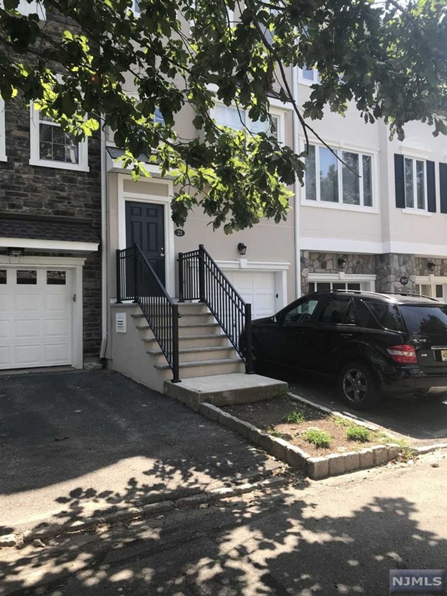 Lovely multi floor town-home in gated community. Approximately 2194 sq. ft of living space - LR, DR, Kitchen with deck and huge family room with full bath and fireplace on ground level. 2nd floor features: Master BDR Suite, Walk in Closet & Guest BDR with its own bath & Laundry. Amenities included: Pool, Exercise Room & Club House. NYC Transportation less than 1 mile away - PET FRIENDLY.