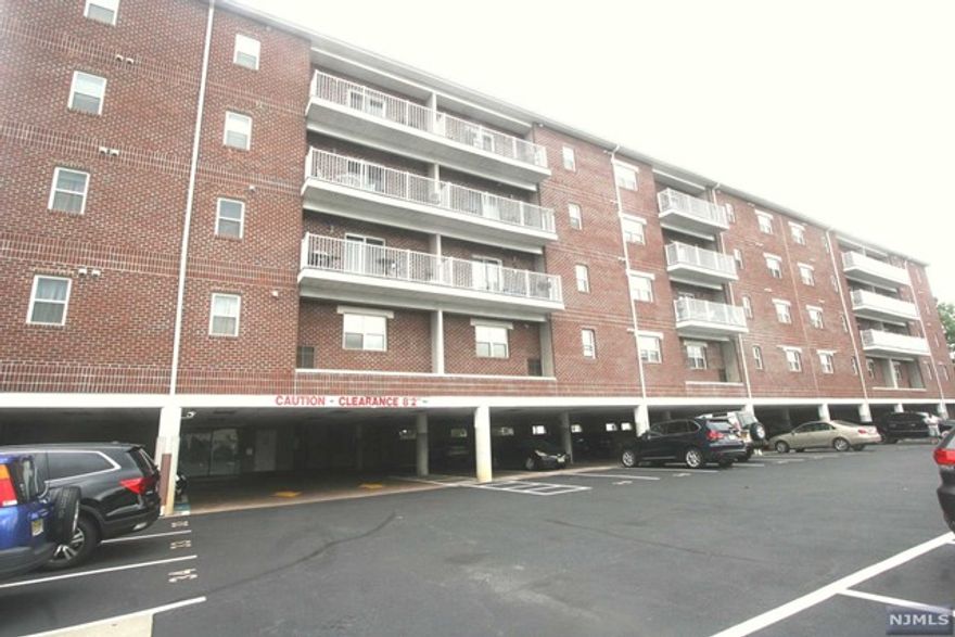 LARGE APARTMENT OFFERS OPEN FLOOR PLAN.GOOD SIZE TWO BEDROOMS W MASTER BEDROOM SUITE TWO FULL BATHROOMS. KITCHEN WITH WOOD CABINETS AND GRANITE COUNTERS.HARDWOOD FLOORS. RECESS LIGHTING THROUGHOUT. TWO PARKING SPACES INCLUDED. CLOSE TO EVERYTHING.
