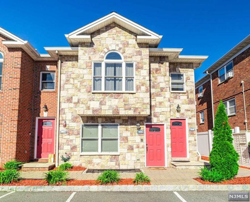 WOW! Contemporary, WELL KEPT luxury townhouse style condo. Gorgeous unit, immaculate, looks like its brand new - A Must See! Open floor plan, two bedroom, two bath home offers BEAUTIFUL hardwood floors throughout, designer eat in kitchen with an abundance of custom cabinetry, granite countertops and breakfast bar, and stainless steel appliances, laundry center on main level, queen bedroom and king size master bedroom suite with sitting area, 2 walk in closets, and luxury master bath. High ceilings, open, airy floor plan, wonderful windows, private rear balcony, lots of closets and storage as well as a private storage room in the basement (7'x22') just for this unit. Come turn this house into a home before someone else does!