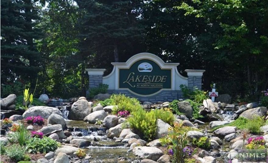 Beautiful End Unit townhouse with wonderful light and views of NYC is looking for it's new owner! This Bucknell style unit has been well cared for an updated by current owners, including newer HW floors on first floor and carpeting on second floor. The First level has a Full Living Room, Dining Room and dramatic 2 story light filled Family Room. The Eat In Kitchen has SS appliances and slider to private patio. The Second Floor has a large MBR with tray ceiling and 2 WIC, MBTH with double sinks and stall shower and jetted tub. Second floor has 2 additional Bedrooms and a Full Bath plus a Laundry. The driveway can accommodate 2 vehicles. Lakeside Community is jam packed with amenities including a clubhouse with billiards room, deck with grill, heated pool, hot tub, tennis courts and a large lake for boating and fishing. Make this your new home today!