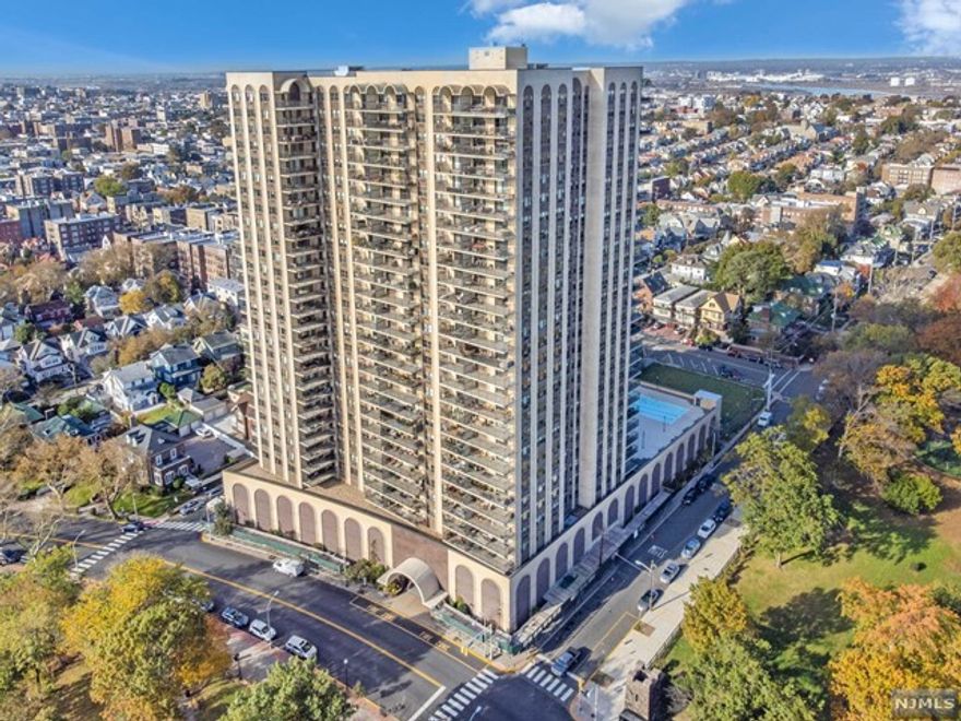 WELCOME TO sparkling NYC/Hudson River panoramas that will DELIGHT! This lovingly-maintained 3-BR/ 2-1/2-bath corner home is one of the largest to be found on iconic Blvd. East. Newer stainless appliances, abundant cabinetry and extensive counter space are features of the vast eat-in-kitchen. The ENORMOUS Living Room/Dining/Den encourages the largest celebrations! GRACIOUS Primary BR offers en-suite full bath, walk-in-closets, plus a rare in-unit laundry! Two additional well-proportioned bedrooms. Expansive floor-to-ceiling closets. Dine al fresco or indulge your inner gardener on the oversize terrace. The Parker Imperial is a luxury building with 24/7 concierge, soon-to-be-enhanced lobby, on-site management, exercise room w/sauna, appealing seasonal pool and covered parking. NYC transportation at your doorstep. Enjoy the offerings of adjacent 167-acre Braddock Park! And doggies are welcome! Savor the lifestyle you deserve; come visit today! (Some photos virtually staged/enhanced.)