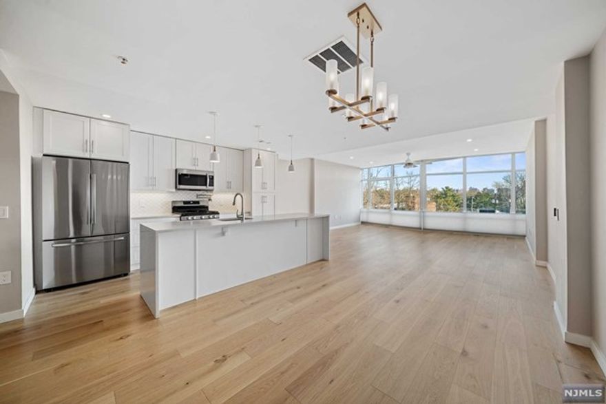 THE CHEN AGENCY (201-346-8888) presents AVENTINE Residence 2G. This modern duplex with an astounding 1891-sf has been completely renovated and awaits your arrival. The floor-to-ceiling eastern walls of windows give this home amazing light. The main living space is anchored by a brand new center island kitchen with quartz counters and stainless steel appliances. Upstairs you'll discover two bedroom suites. The primary bedroom is a true sanctuary highlighted by a new spa-like bath. The second ensuite bedroom features access to a private patio. Stunning new wood floors, an office alcove, bedroom-level laundry room, central heat & air, custom fitted closets and two side-by-side deck parking spaces complete this wonderful offering. DUE AT LEASE SIGNING: 1st month rent, 1.5-month security, 1-month broker fee, $150 move-in fee to the building/management. There is a $500 moving day damage deposit to the building. No smoking. Contact TOM MCCARTHY 201-206-8144 or Tom@ChenAgency.com