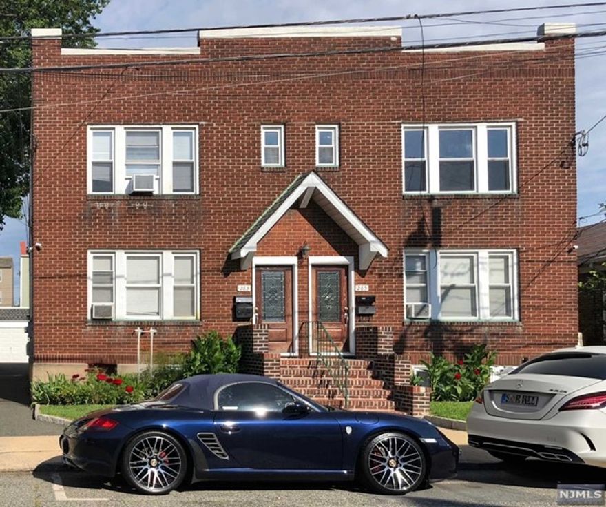 Sun filled first floor apartment with basement storage and laundry machine. 2 Bedrooms with 1 full Bath, hardwood flooring, spacious eat in kitchen, large closets. Walking distance to public transportation and all shopping. Also included 1 car garage.