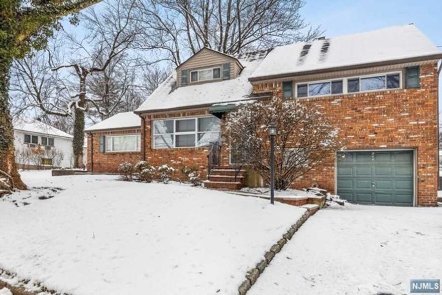 This beautiful split-level home features 3 bedrooms and 2 bathrooms, making it the perfect space for those who would like a little extra room to spread out. The home boasts a spacious family room with large windows that let in plenty of natural light, and a cozy fireplace that's perfect for chilly evenings. Glass sliding doors lead out to a patio. A great spot for outdoor entertaining or just enjoying a quiet moment in the fresh air. The kitchen is fully equipped with stainless steel appliances, granite counter tops and plenty of storage space, making meal prep a breeze. It's open to a dining area, adjacent to the formal living room. Up one short set of stairs, you'll find two comfortable bedrooms, each with ample closet space and a full bathroom. The 3rd level is the primary bedroom which includes an en-suite bathroom. This split-level home is located in a quiet neighborhood close to NYC transportation, schools, shopping and houses of worship.