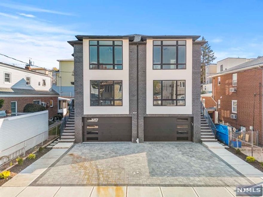 WELCOME TO 360 9TH STREET, AN ALL BRICK BRAND NEW DUPLEX LOCATED ON A QUIET RESIDENTIAL STREET, MAIN LEVEL BOASTS 9FT CEILINGS WITH OPEN LIVING ROOM & DINING ROOM WITH FIREPLACE, MODERN EAT-IN KITCHEN WITH STAINLESS STEEL APPLIANCE PACKAGE, FAMILY ROOM, AND DECK OFF OF REAR LEADING TO YARD....PRIMARY SUITE WITH SPA LIKE BATHROOM COMPLETE WITH GLASS ENCLOSED SHOWER, DOUBLE VANITIES, AND TUB...PLUS AN ADDITIONAL TWO BEDROOMS WITH FULL BATH...GROUND LEVEL COMPLETE WITH 2 CAR GARAGE, FINISHED RECREATION ROOM, FULL BATH, AND ENTRANCE TO BACKYARD...