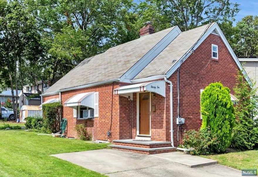 Fabulous opportunity to own a three-bedroom home on a 135 deep lot in prime Bergenfield neighborhood. Main level features a large living room with a fireplace, an updated eat in kitchen with stainless appliances, two nice sized bedrooms and a full bath. Second level features 1 additional bedroom, rec room and a full bath. Finished basement features tons of storage, a full bathroom, laundry and an office. Freshly painted interior as well as hardwood floors throughout main level. Home located in close proximity to houses of worship, parks, schools and transportation.